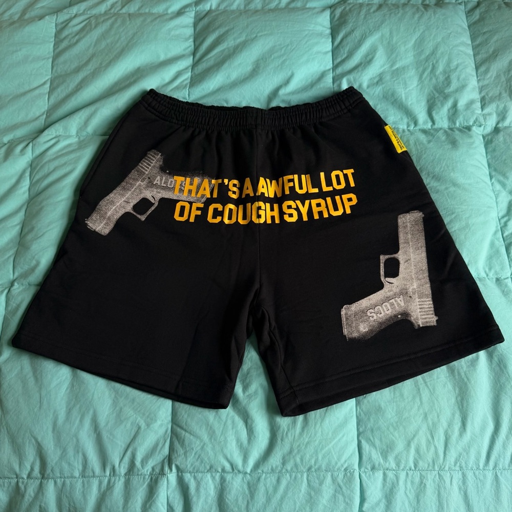 Men's Black Athletic Shorts with Yellow Graphic Text
